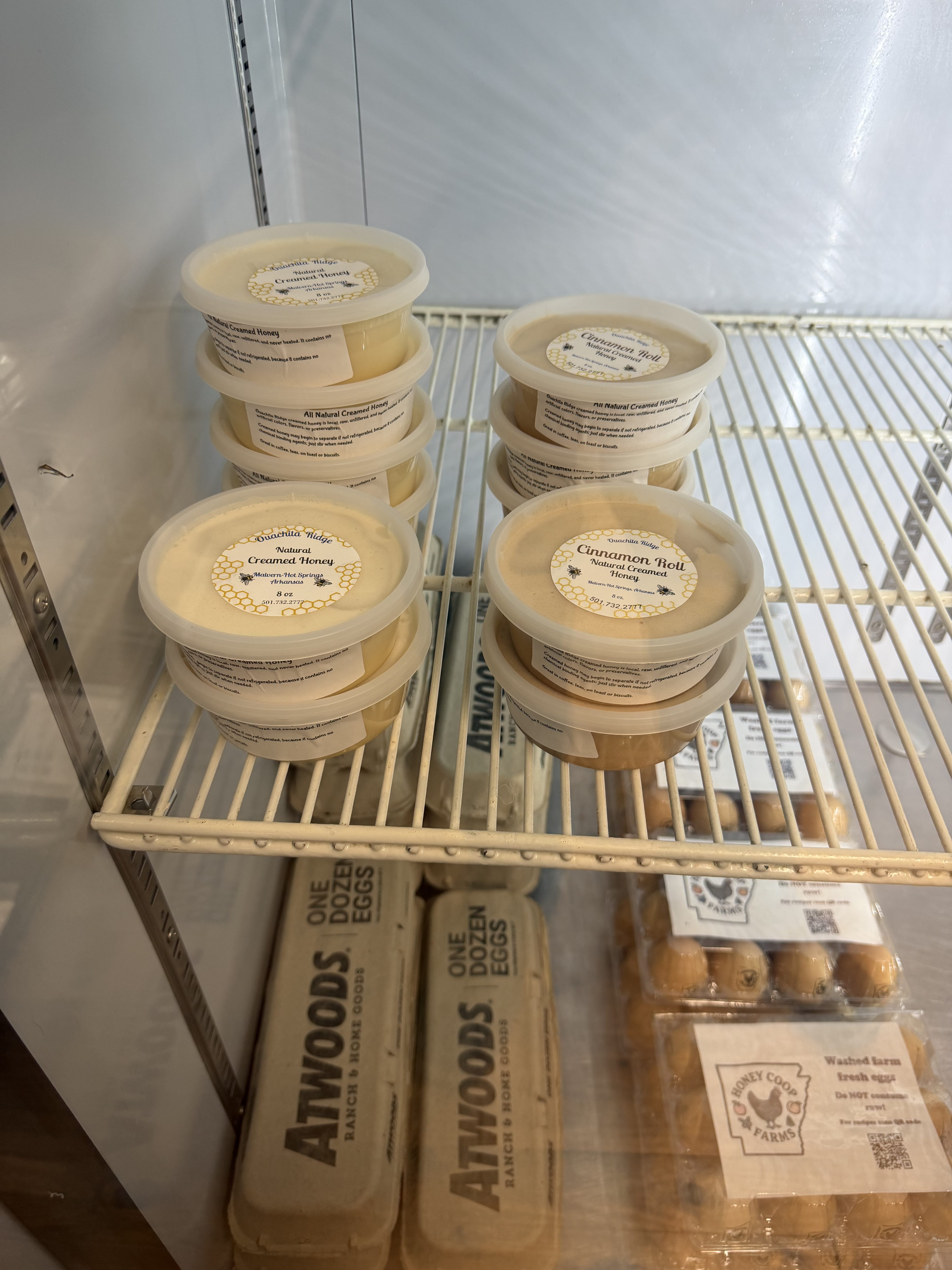 Market shelves with local goods at Trap Mountain